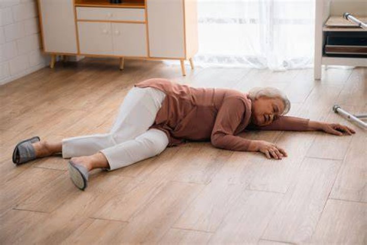 How do you pick up an elderly person who fell?